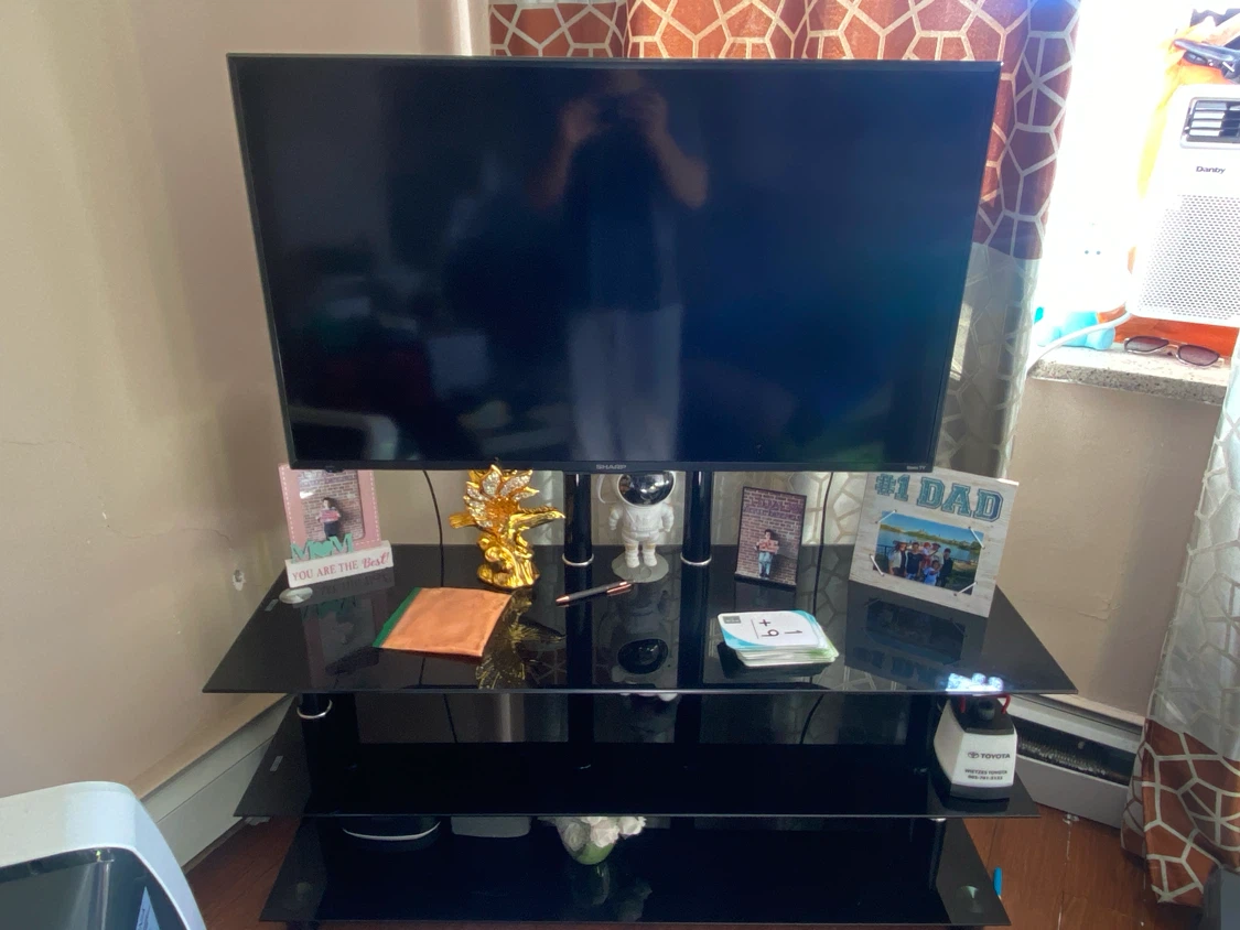 Black Glass TV Stand and TV