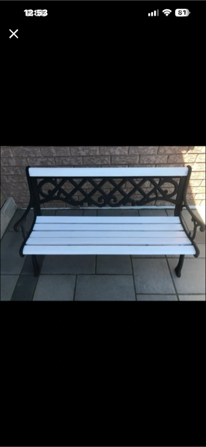 Black and white metal garden bench
