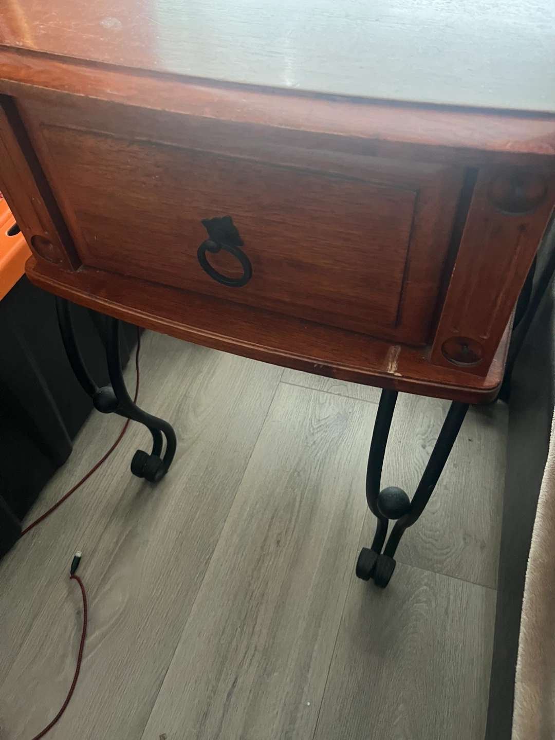Wooden bedside table with metal legs