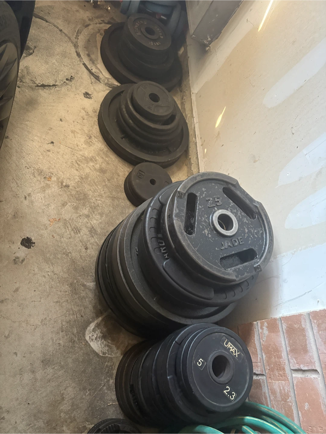 Assorted weight plates rubber and iron