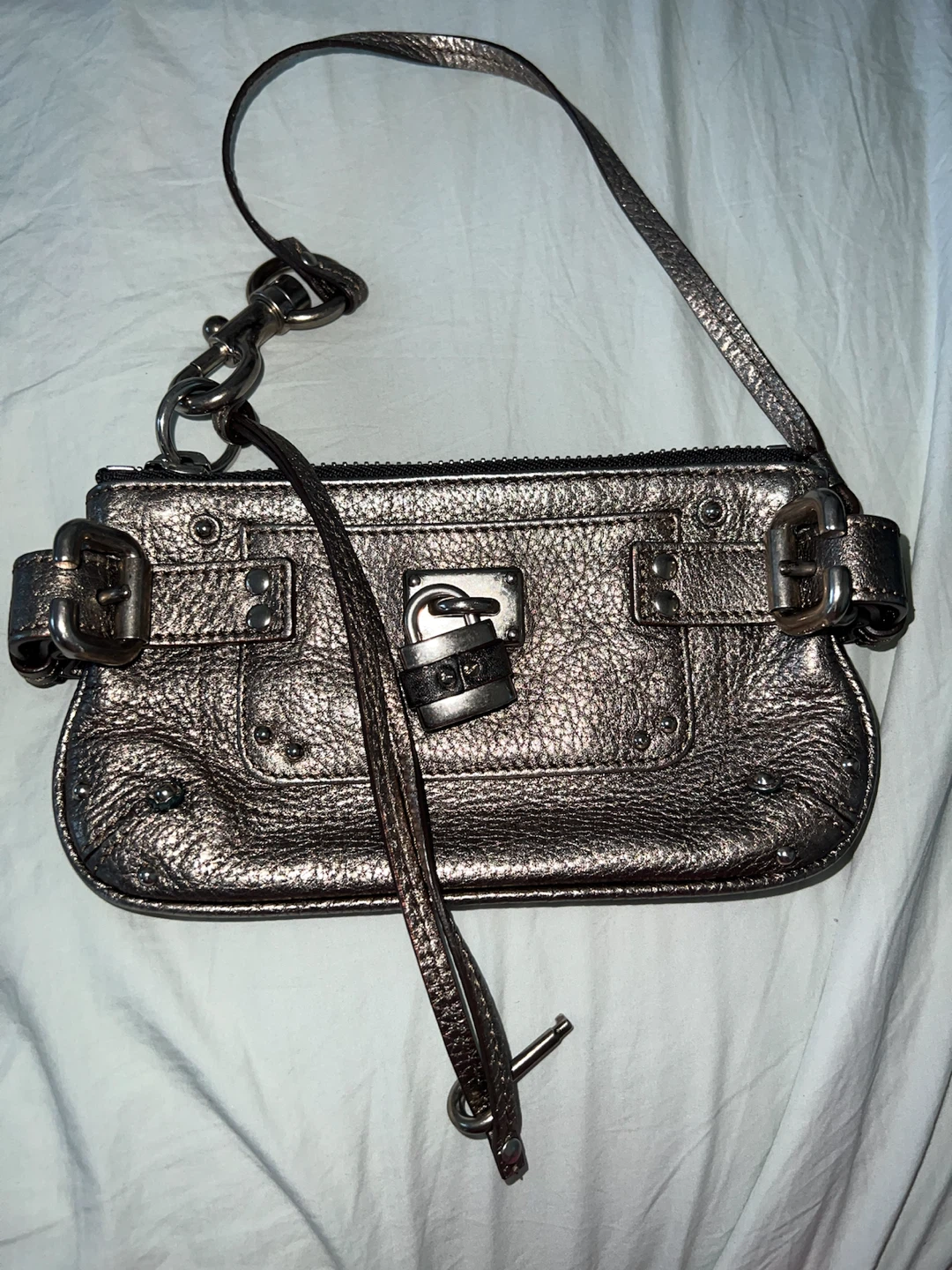 Chloé metallic leather wristlet