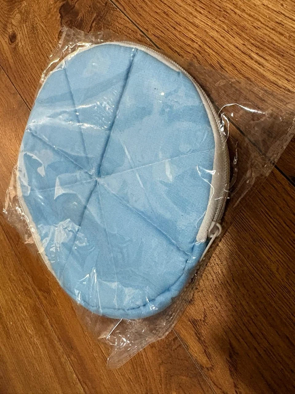 Blue round zippered pouch