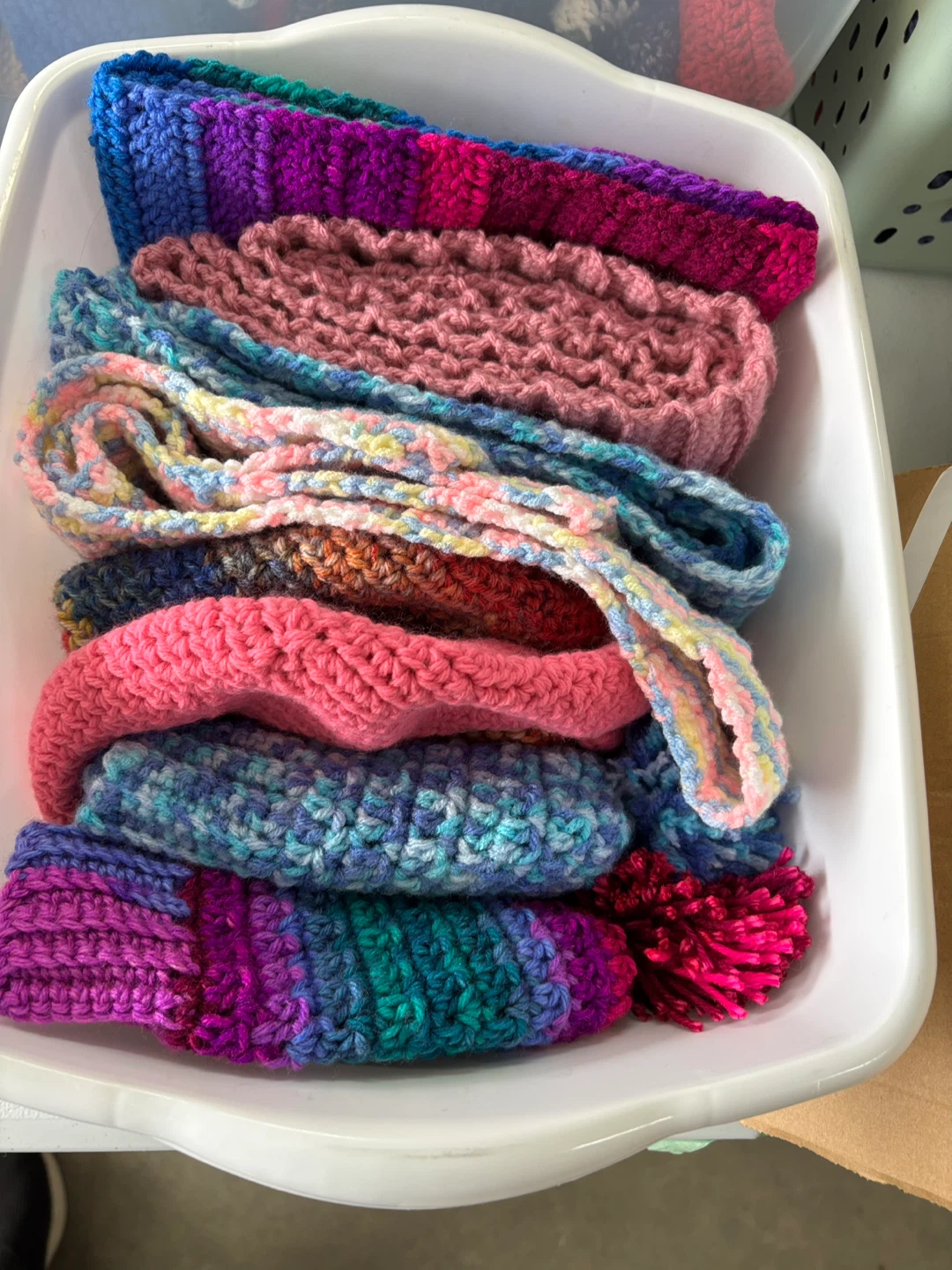 Hand-crocheted scarves, slippers, hats, toques, headbands