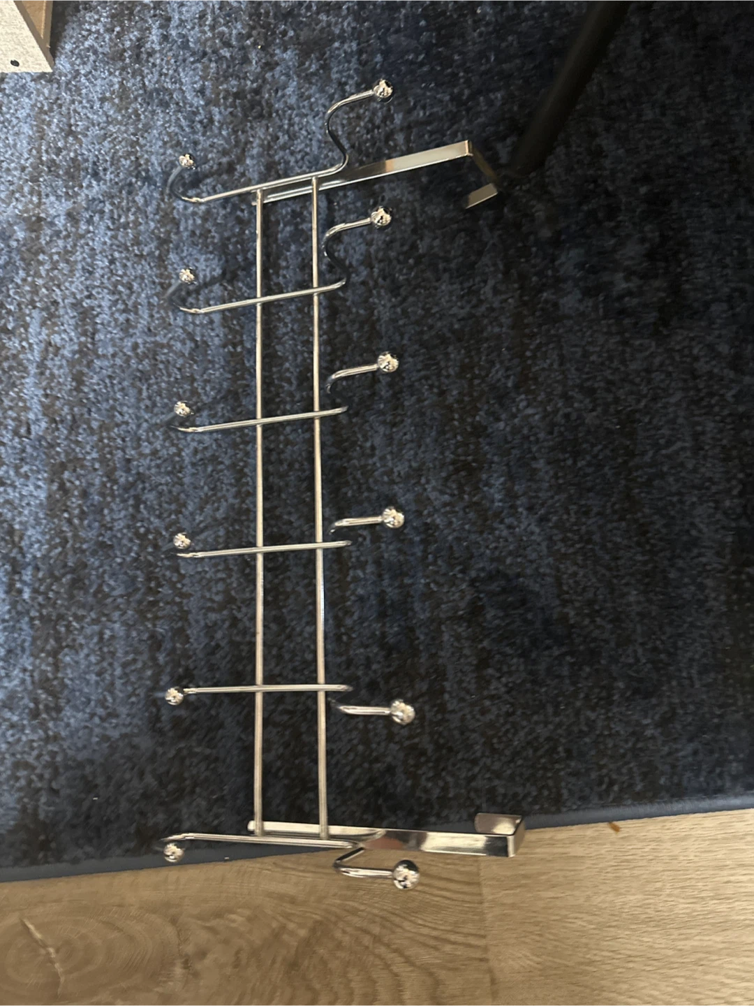 Over-the-door metal coat and accessory rack