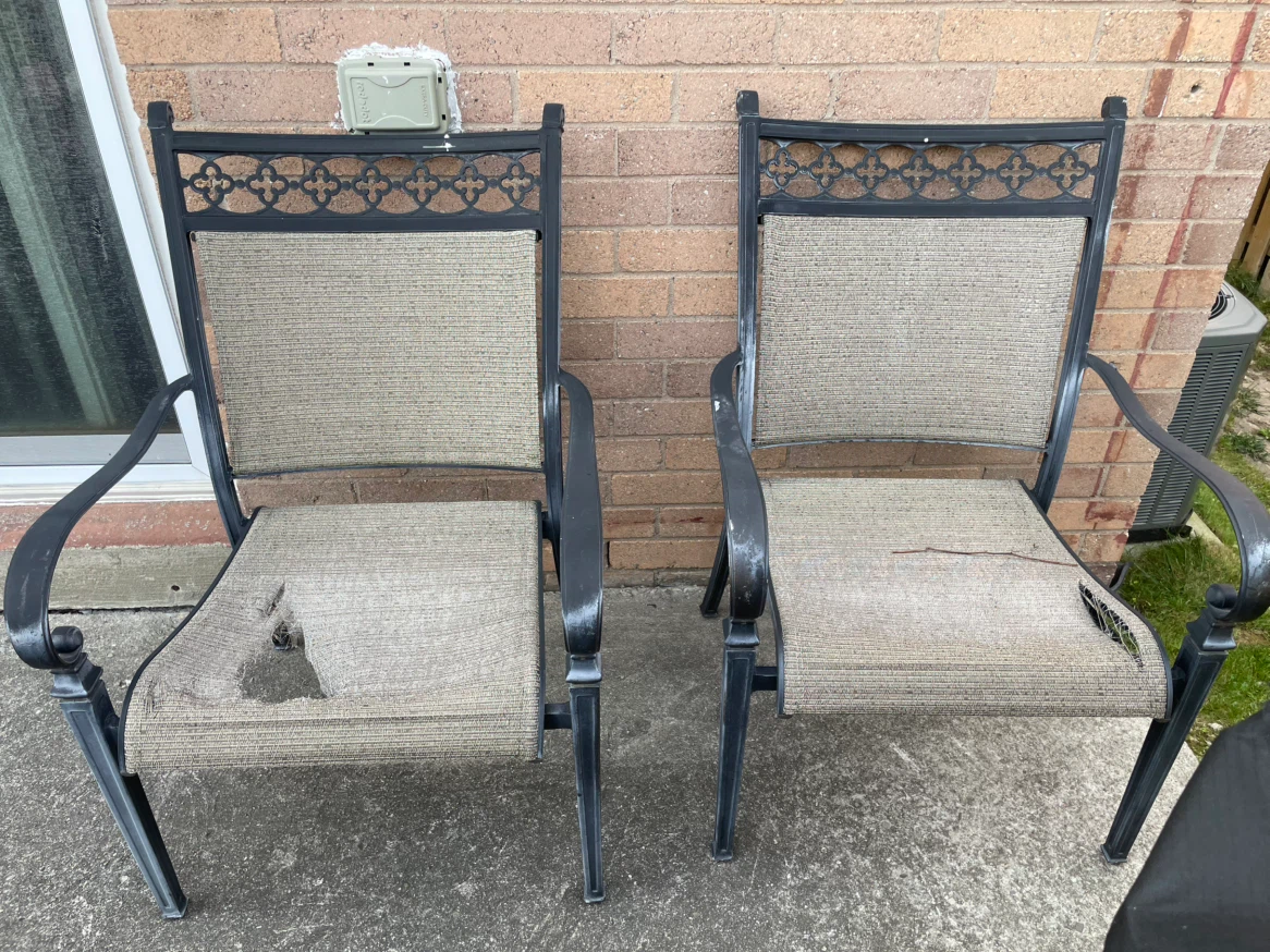 Two outdoor patio chairs
