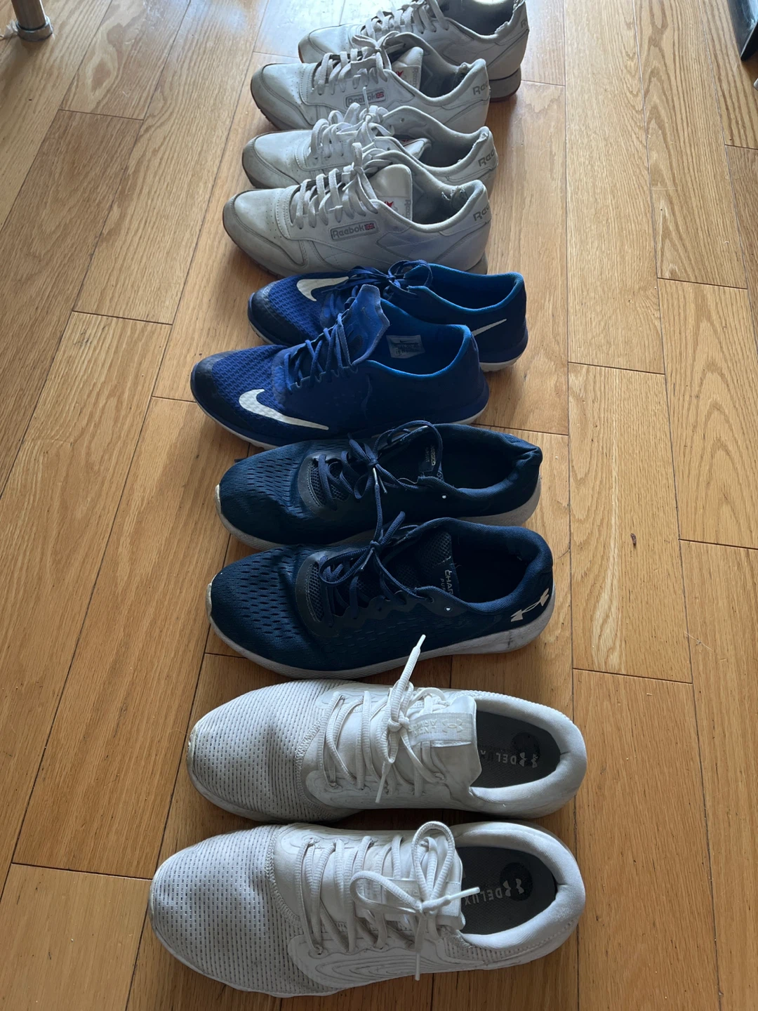Six pairs of men shoes Reebok Nike under amour