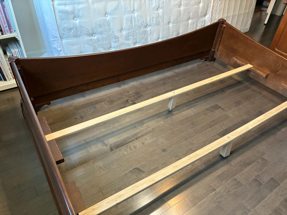 Solid wood king sleigh bed.