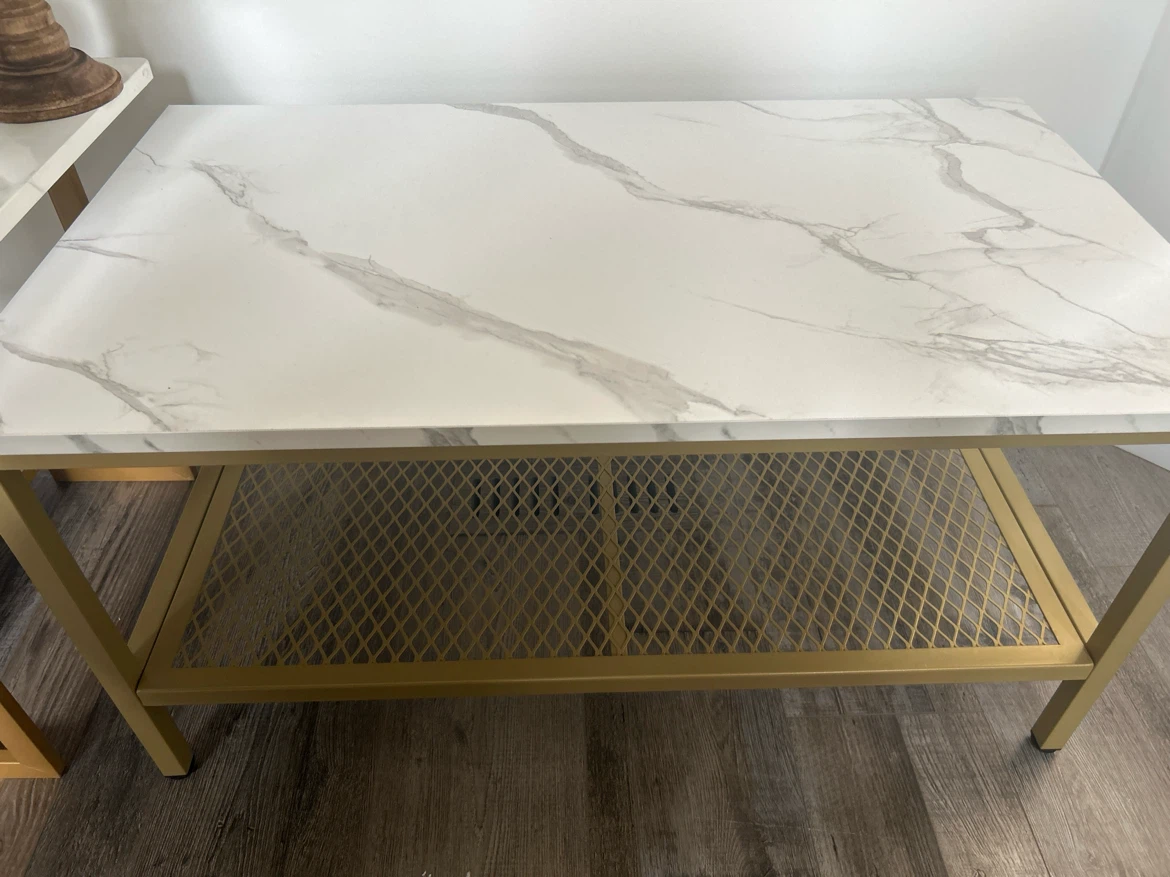 Marble-look coffee table with gold metal shelf
