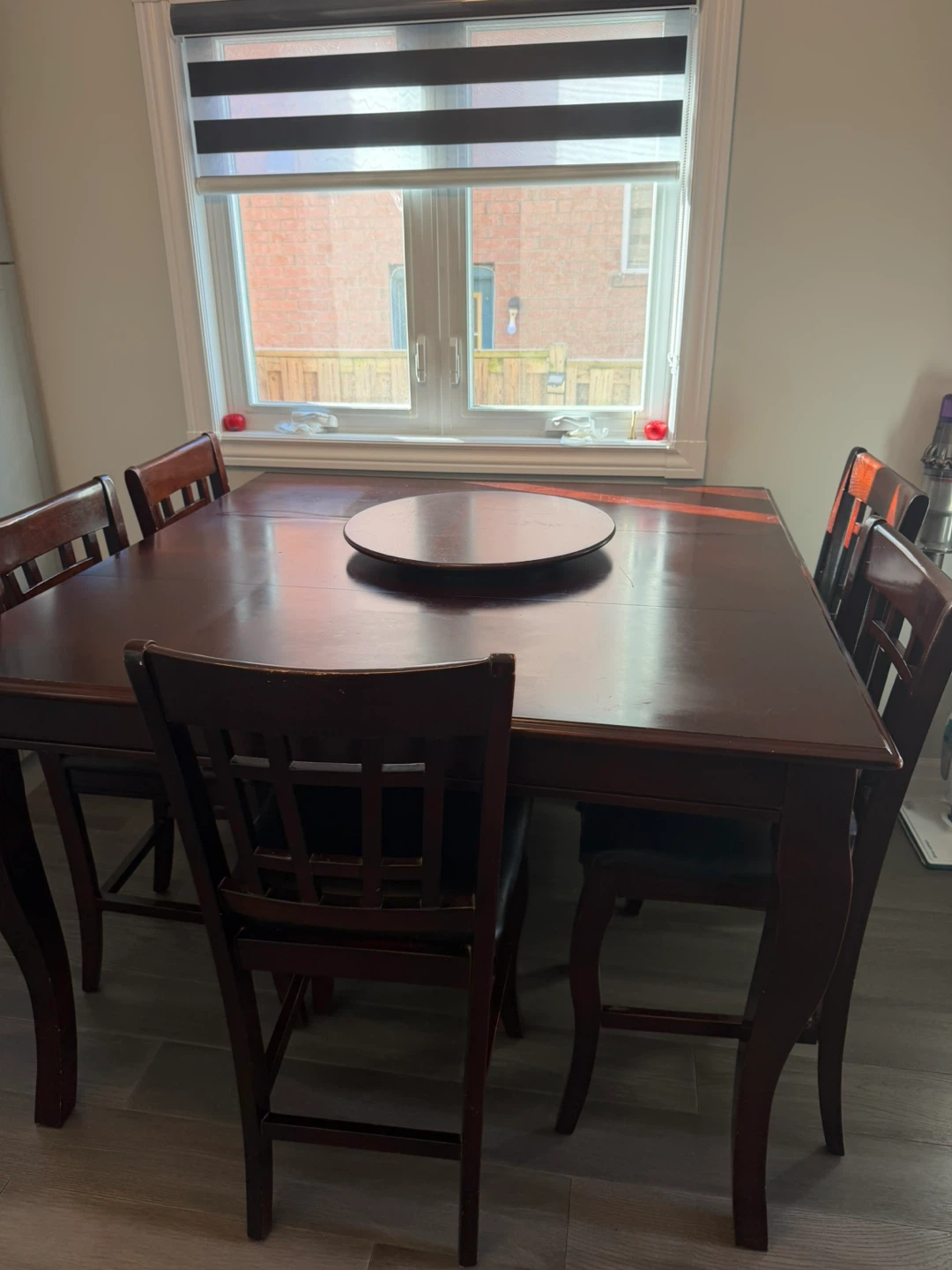 Dark wood dining table with  5 chairs