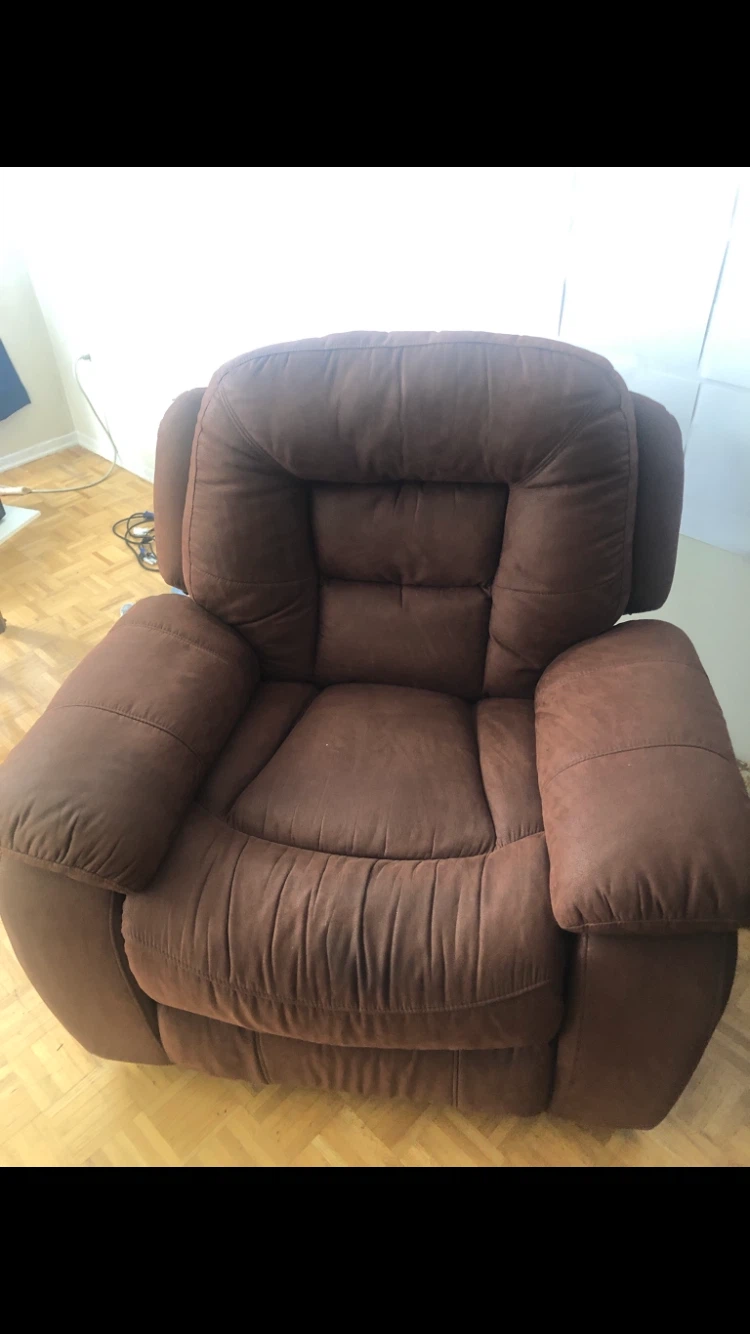 Brown reclining armchair