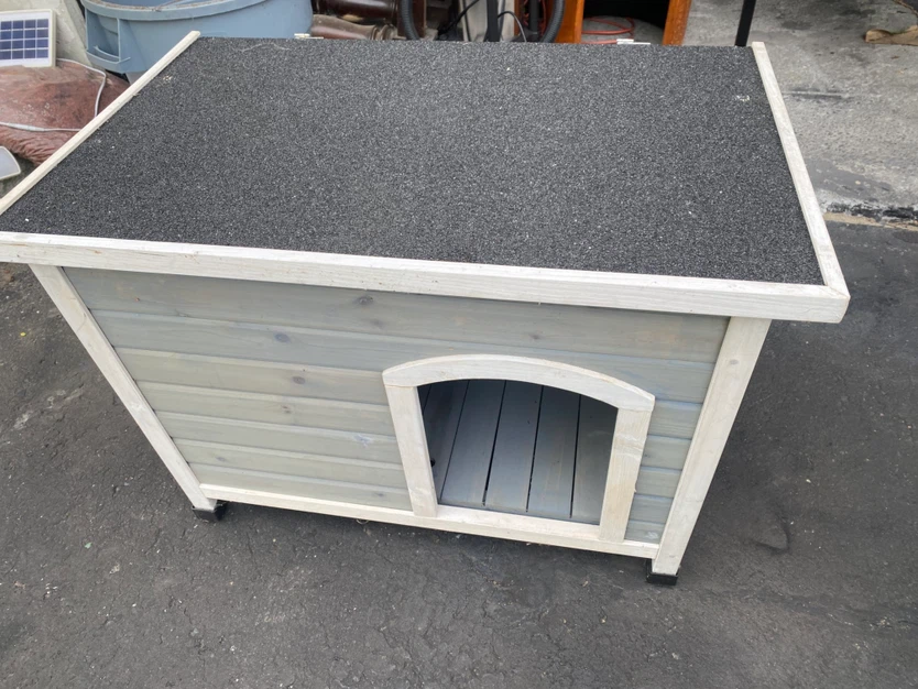 Wooden outdoor dog house
