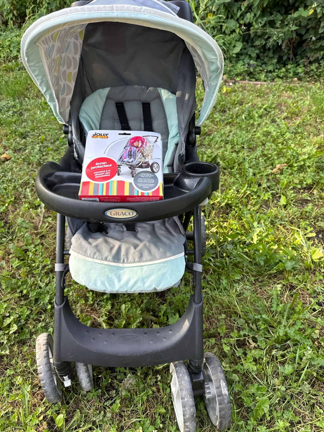 Graco Baby Stroller with Jolly Jumper Rain Cover