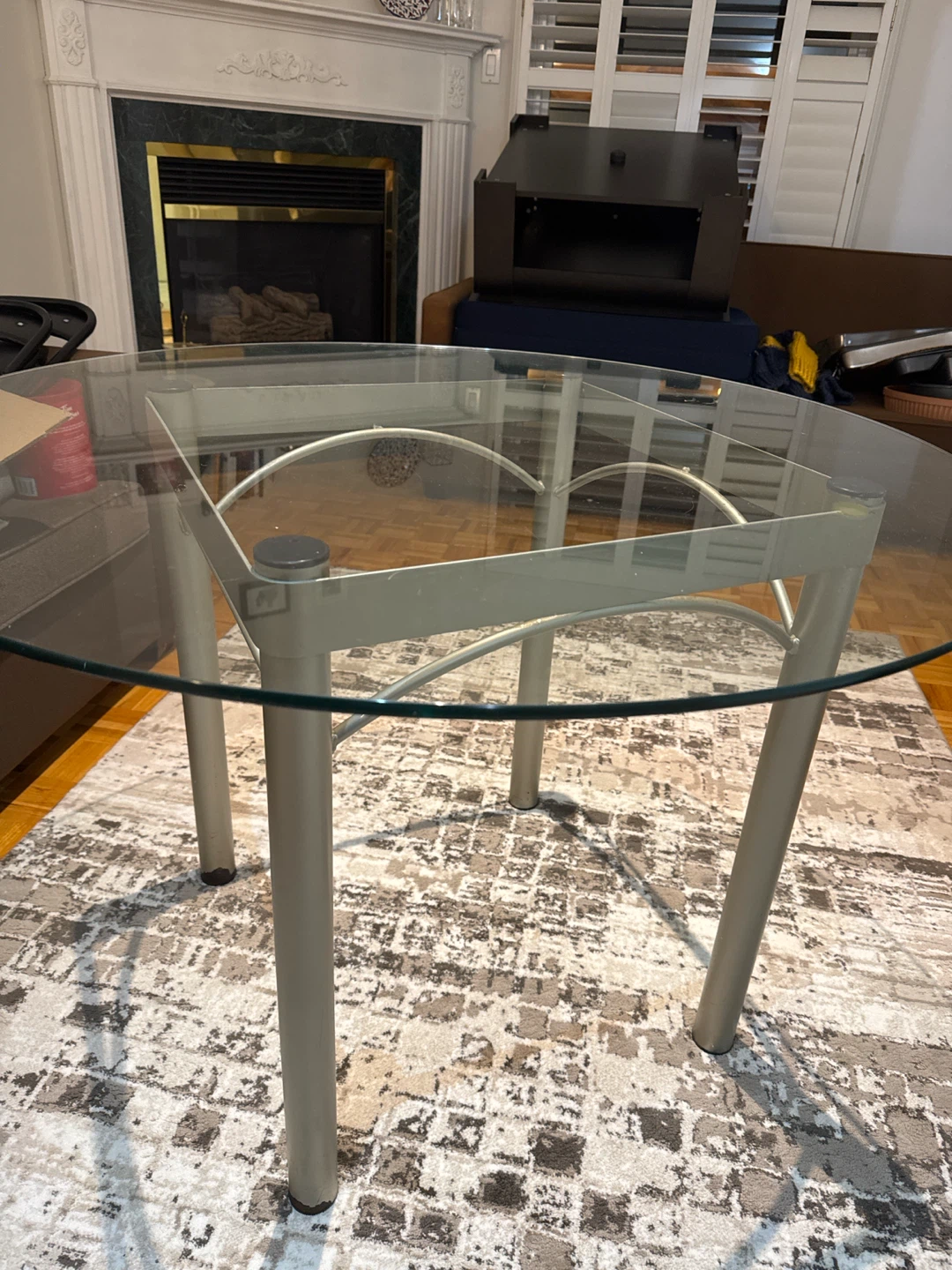 Round glass top dining table