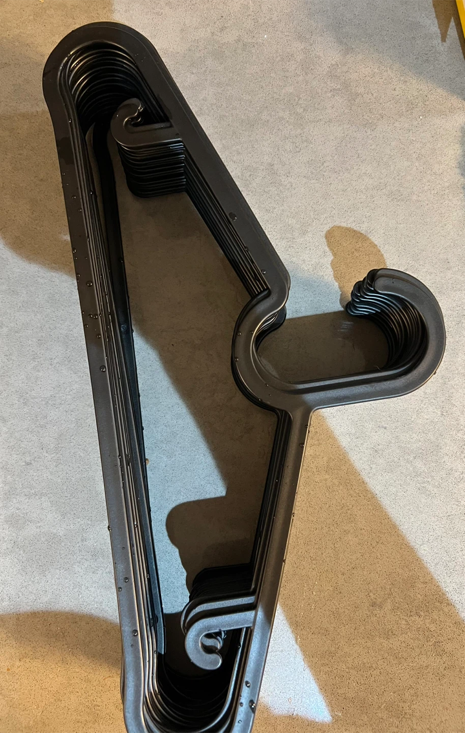 Set of Black Plastic Hangers