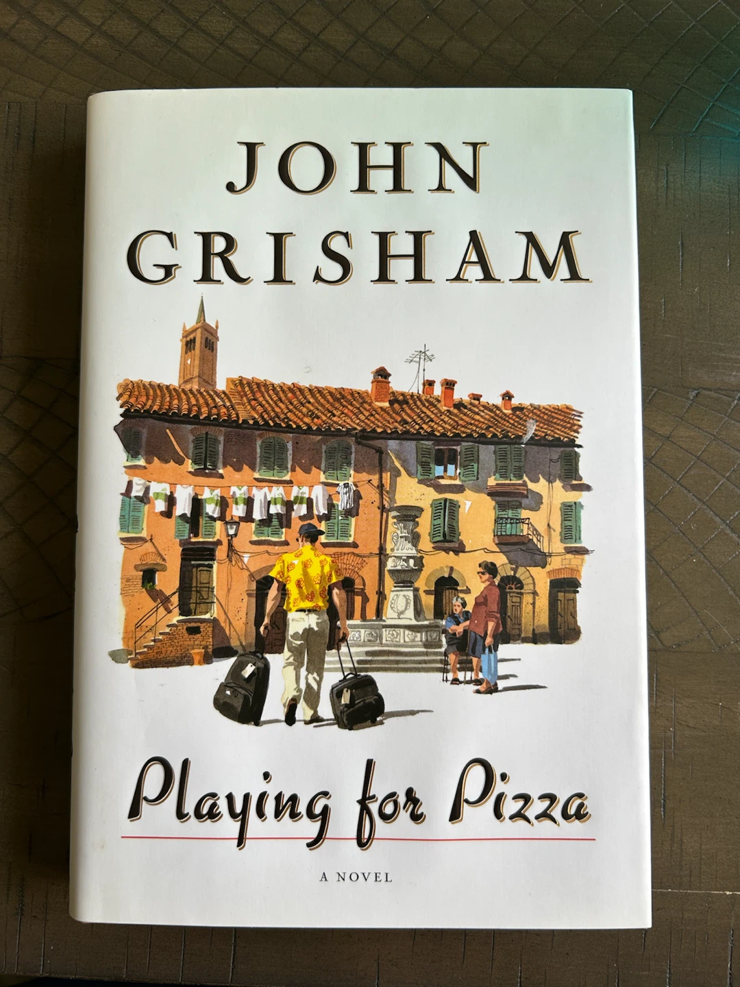 Book - “Playing for Pizza” by John Grisham (Brampton)