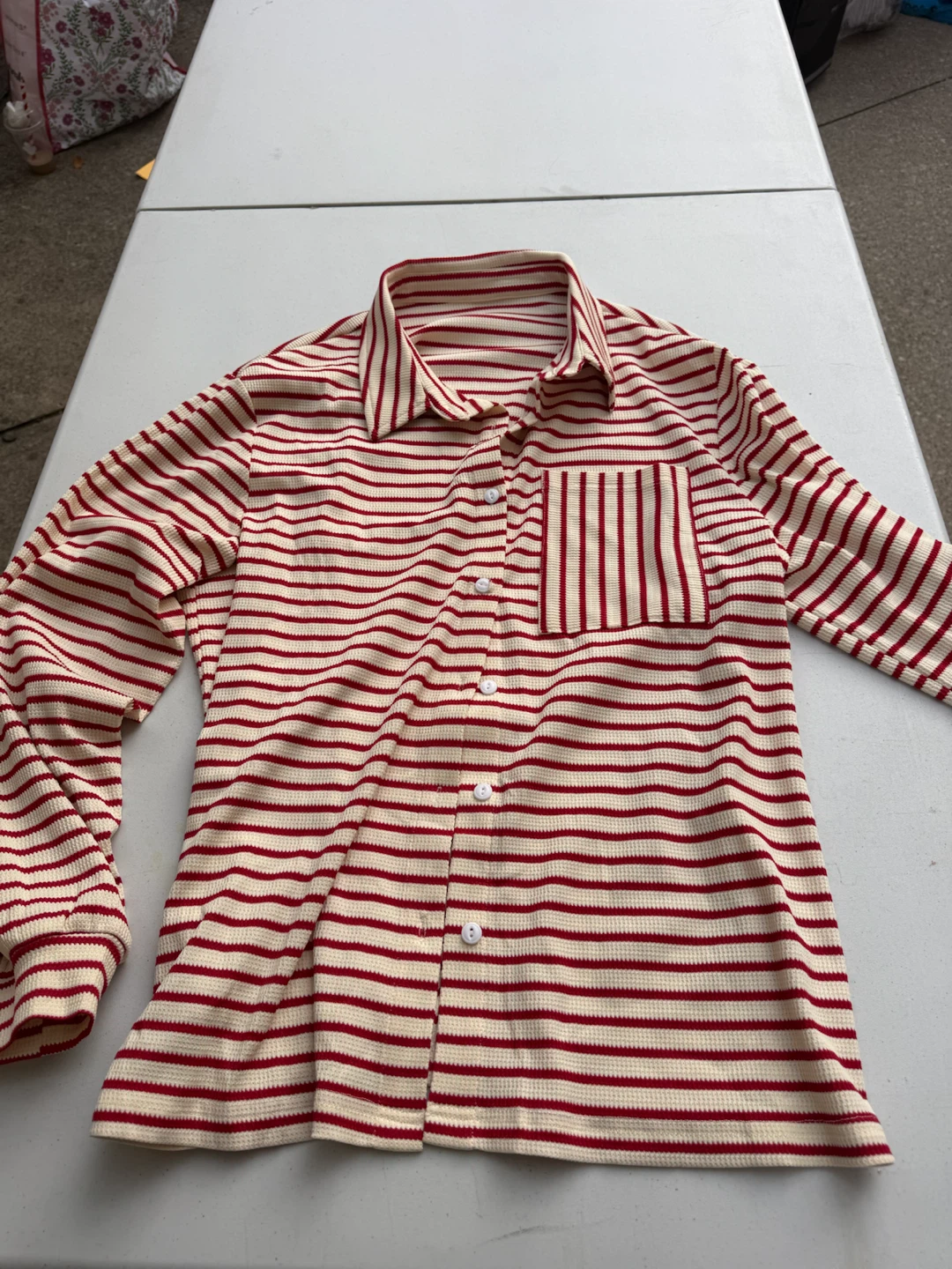 Red and cream striped long-sleeve shirt