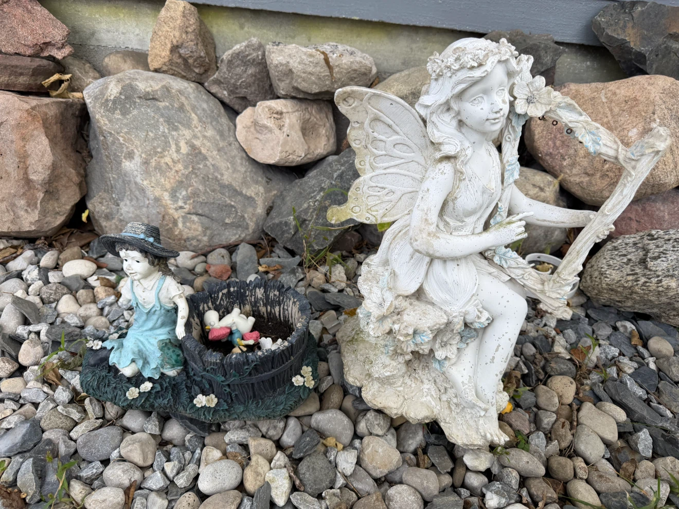 two decorative garden statues- both for 15$