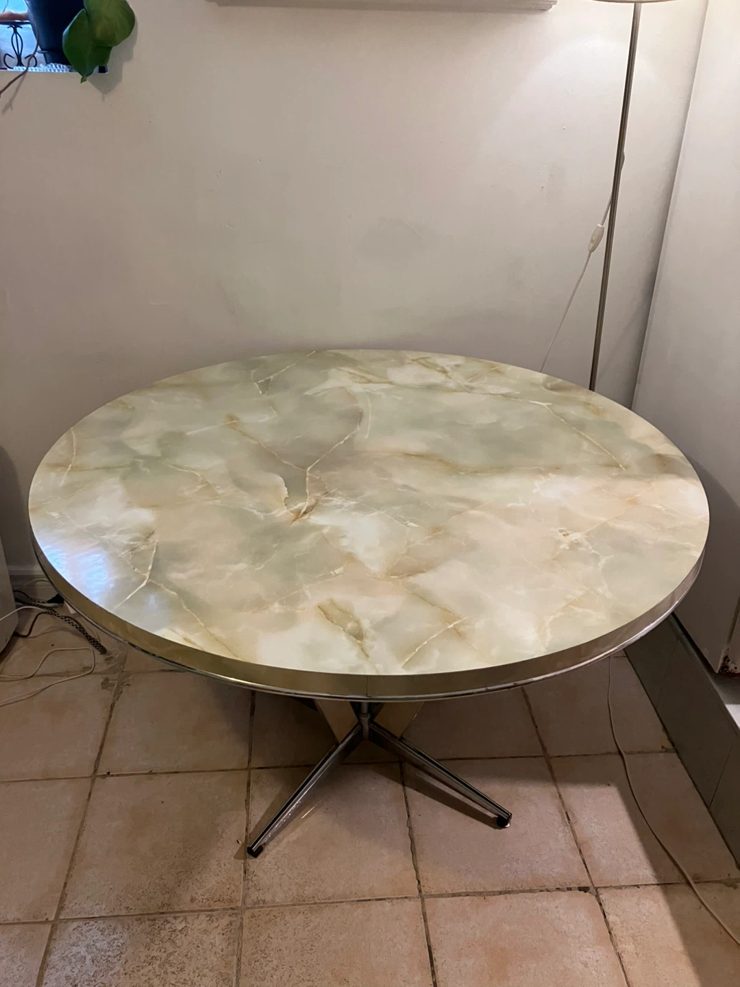 Round faux marble dining table