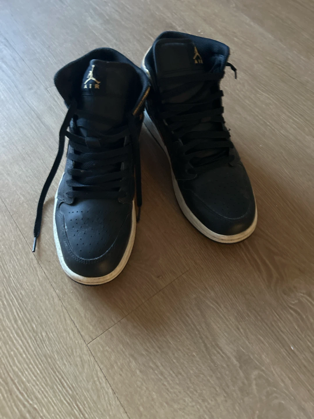 Air Jordan Mid Black and Gold Sneakers