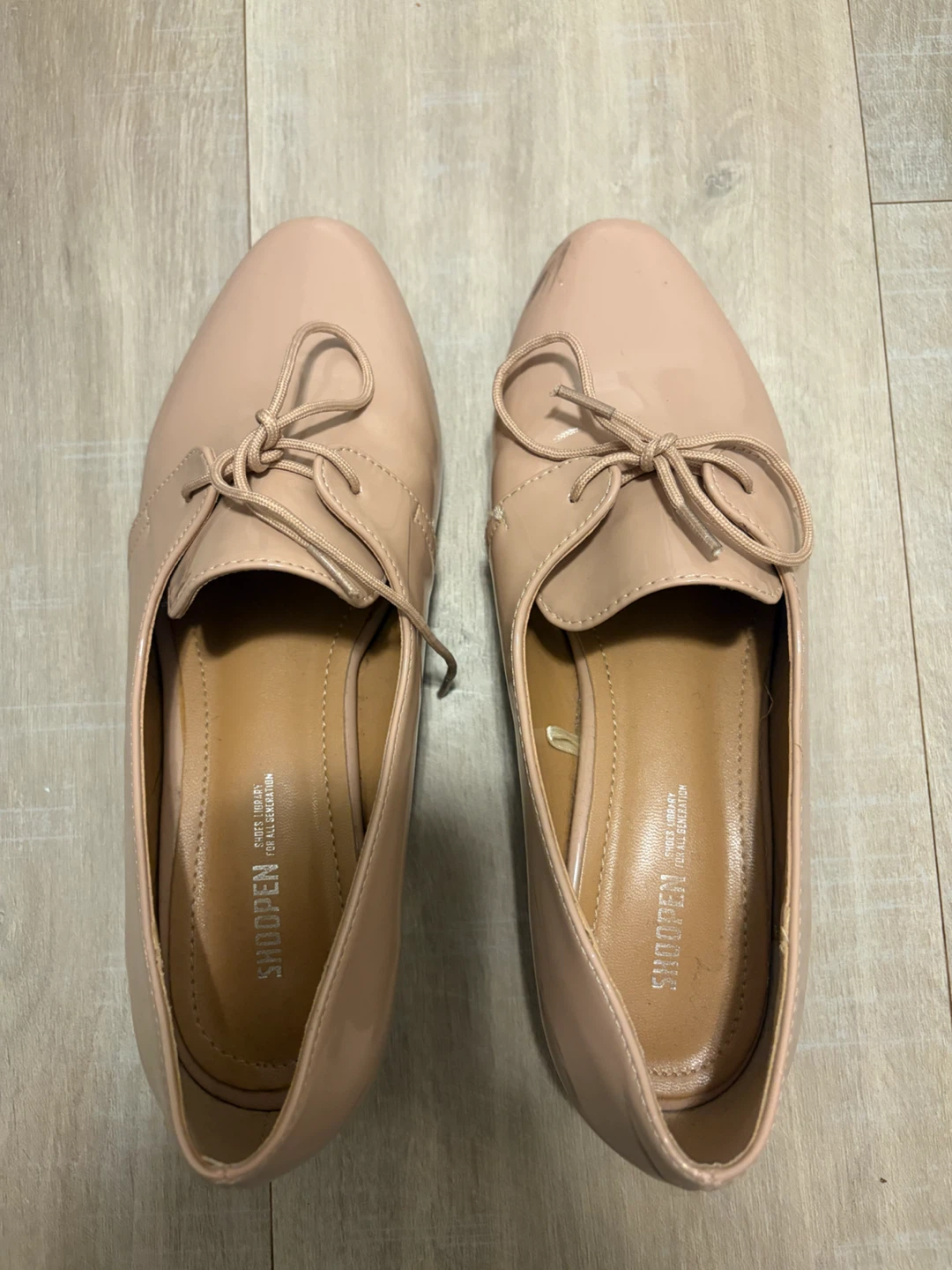Shoopen beige patent lace-up flats