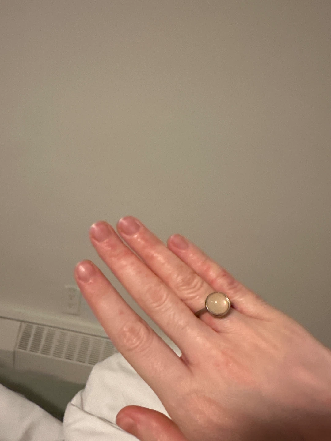 Pink ish cream stone ring