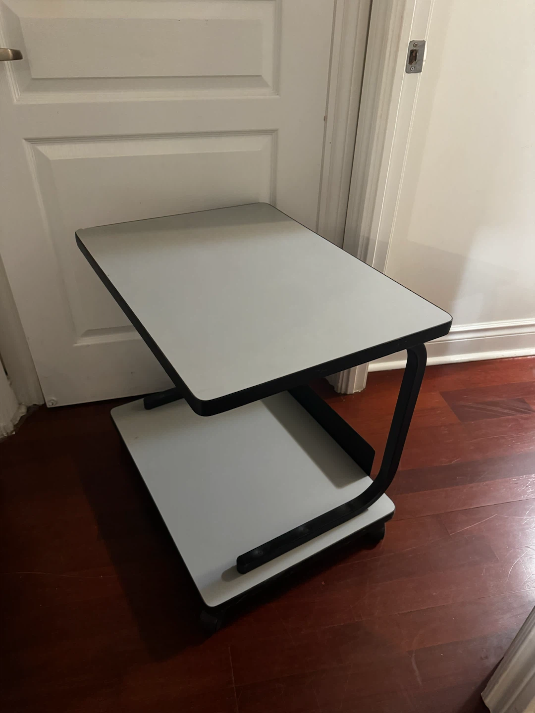 Rolling side table with shelf