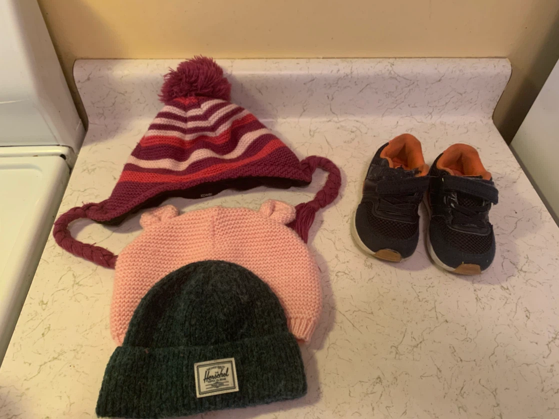 Assorted Winter Hats and Toddler Shoes