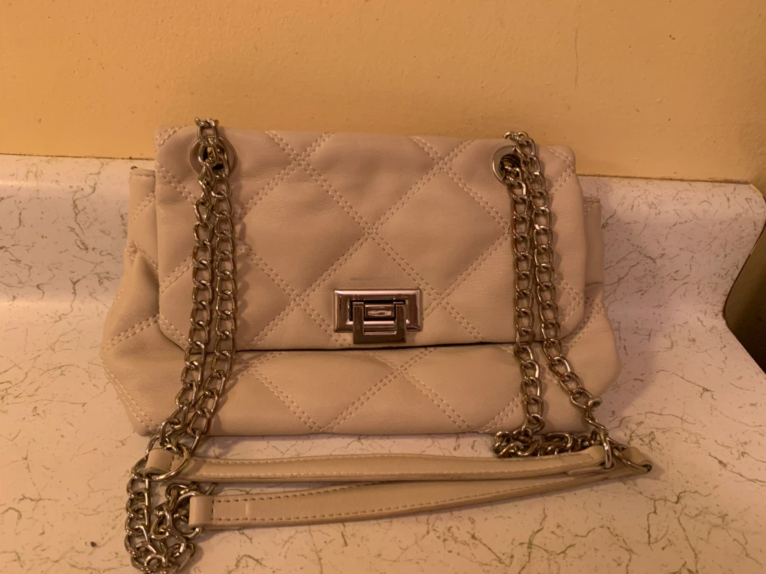 Assorted handbags and cosmetic pouches collection