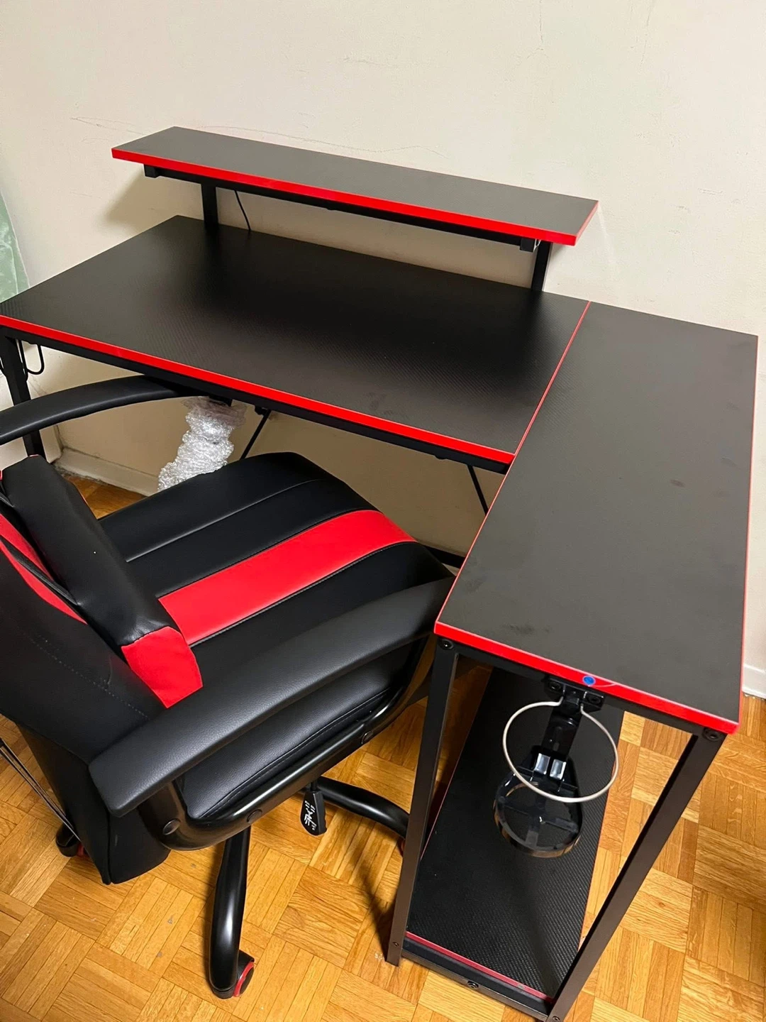Red and black gaming chair and L-shaped desk set