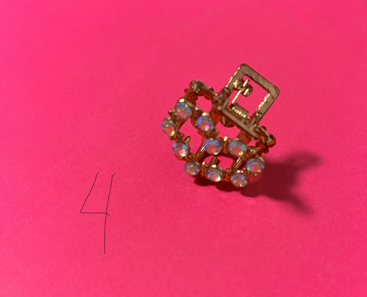 Gold-tone crystal embellished hair claw clip