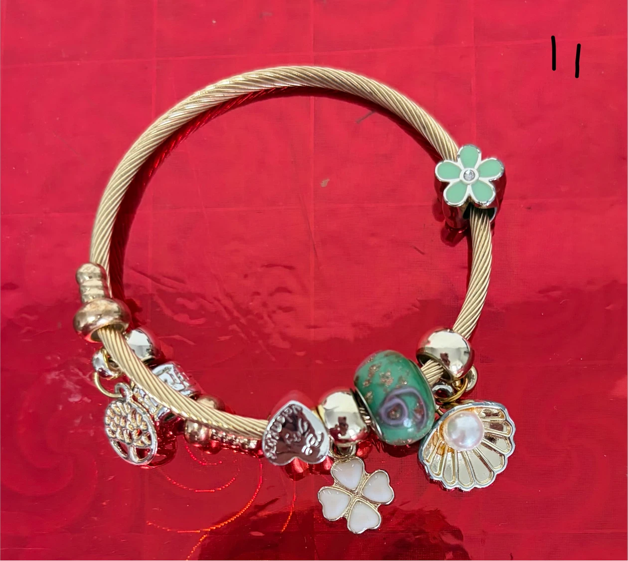 Charm Bracelet with Assorted Floral and Seashell Beads