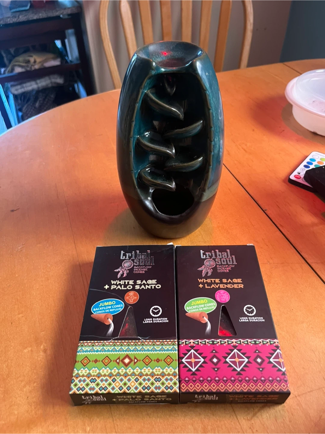 Back flow incense burner with incense