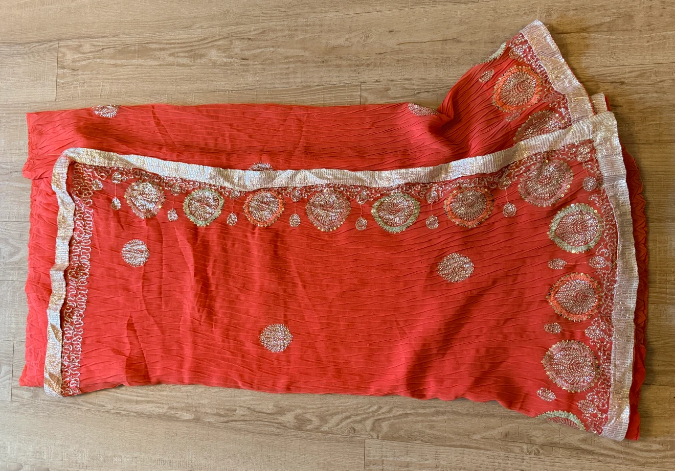 Orange Embroidered tissue saree with Sequin Detailing