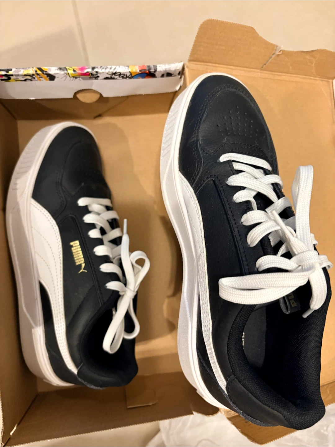 Puma Black and White Sneakers