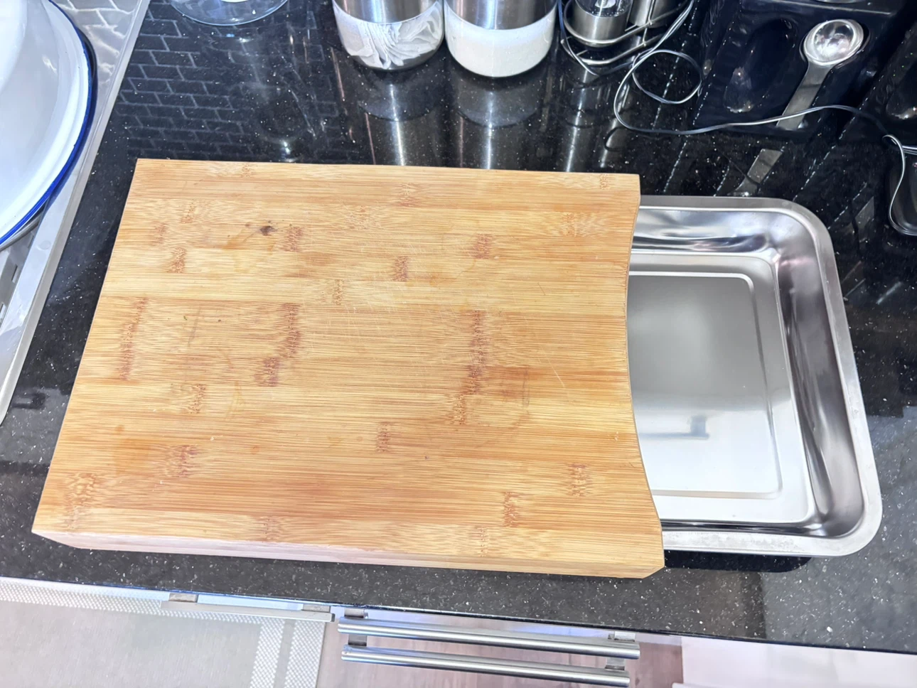 Wood cutting board w/slideout stainless steel tray