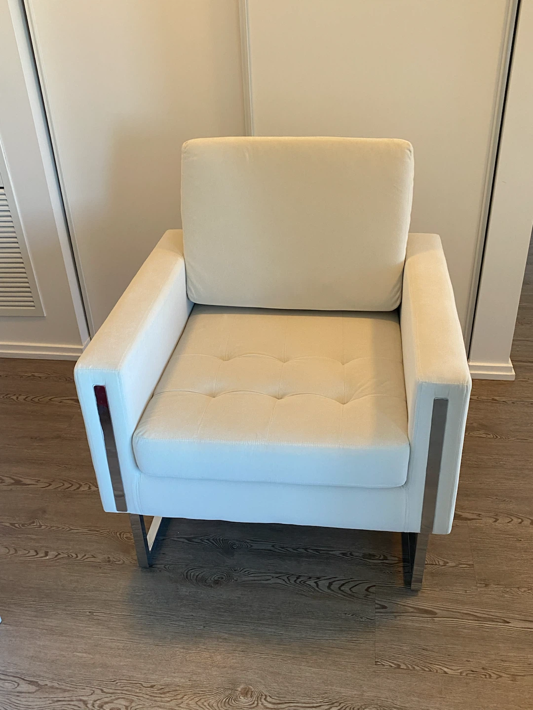 Modern white accent chair with metal frame