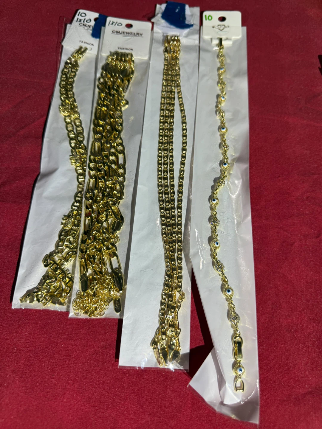 Set of 4 Gold-Tone Fashion Chains and Bracelet