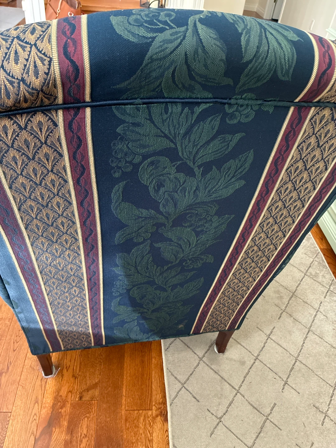 Traditional patterned wingback armchair - photo 3