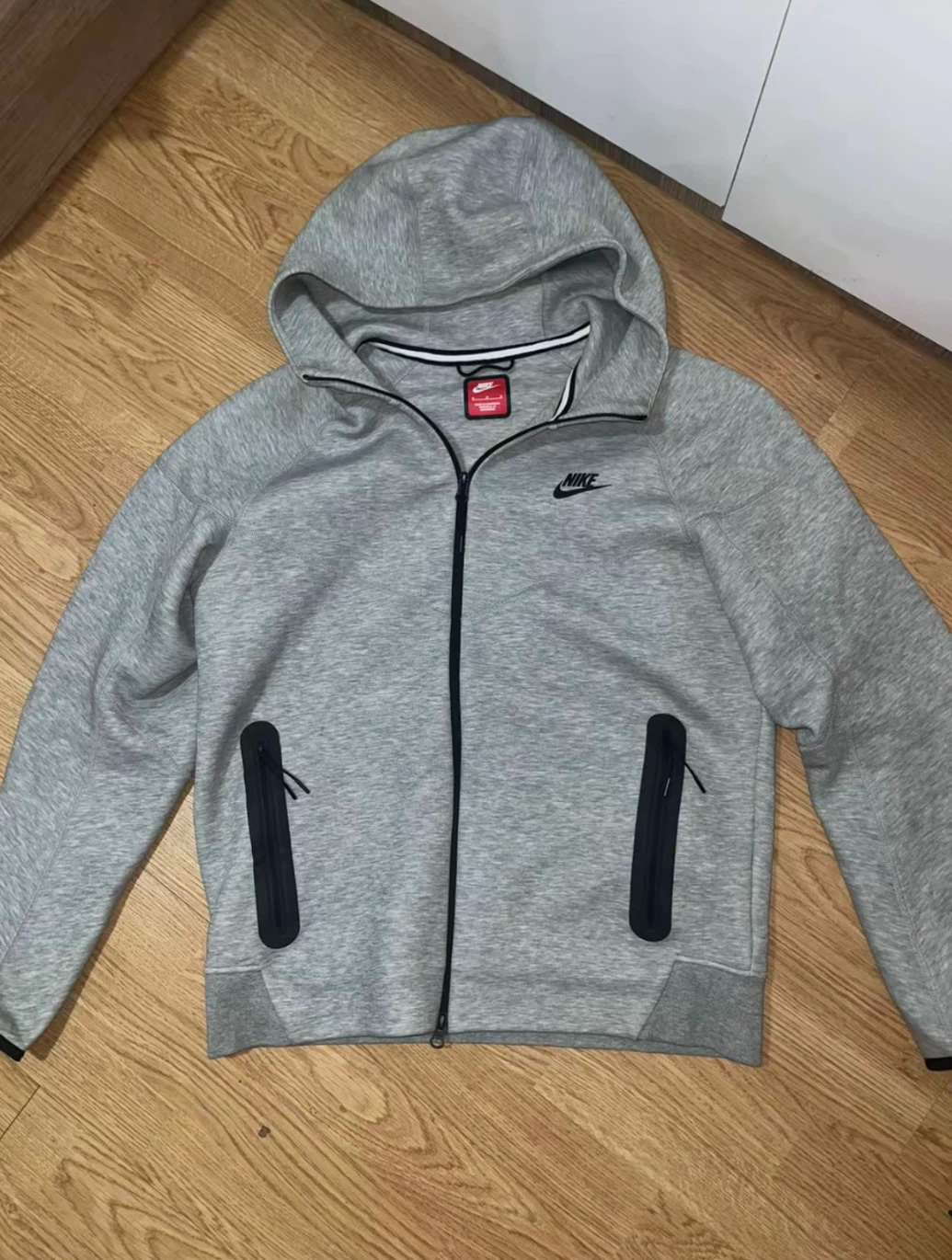 Gray Nike tech Suit