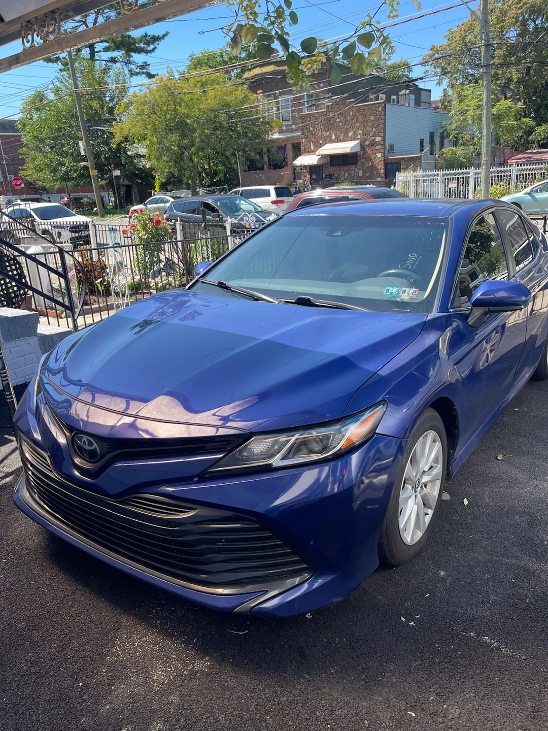 Blue Toyota Camry LE