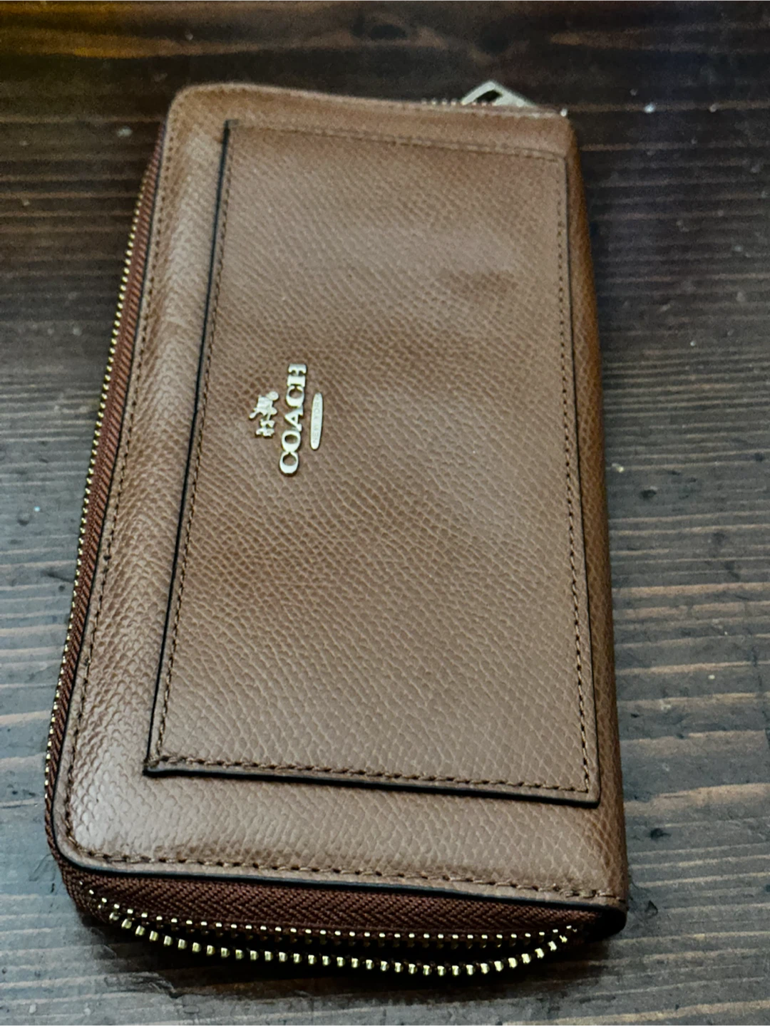 Brown leather coach wallet