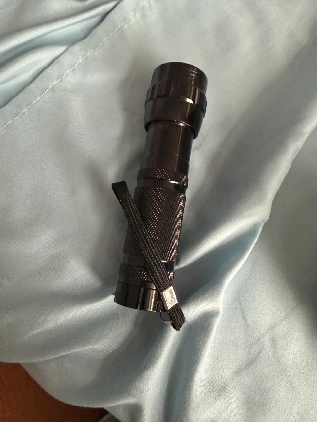 Black handheld LED flashlight