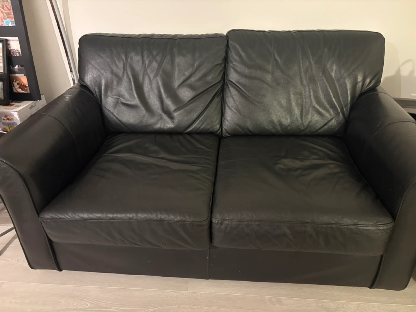 Black two-seater leather sofa - photo 2