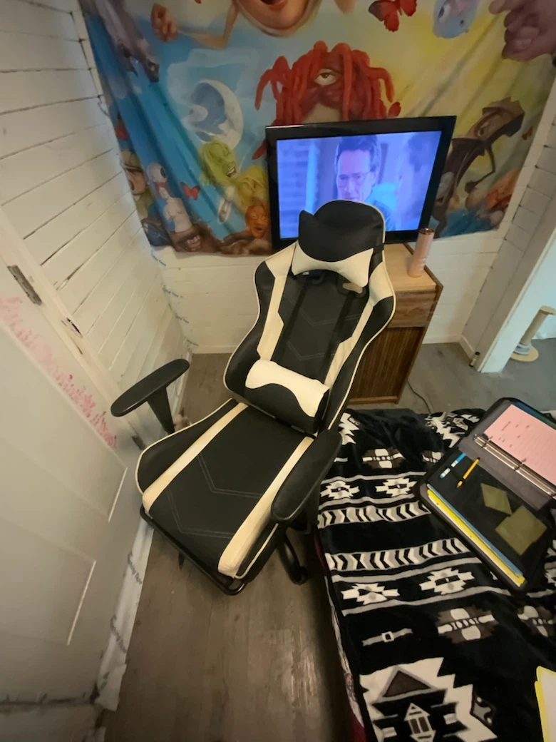 Black and white gaming chair with footrest - photo 2