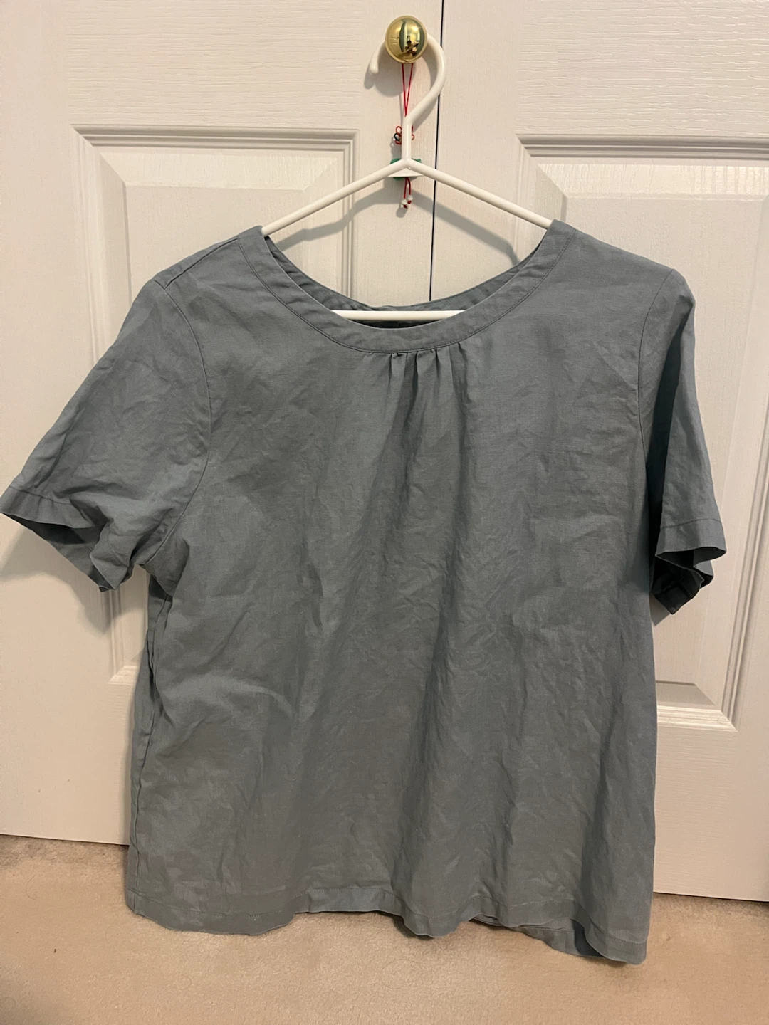 Blue button-back short sleeve blouse