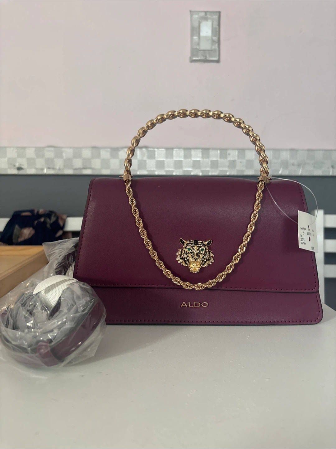 ALDO Burgundy Handbag with Gold Tiger Accent