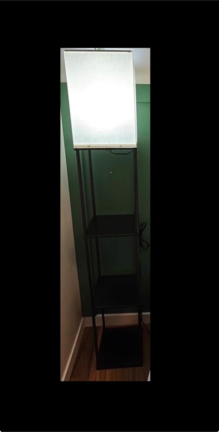 Black floor lamp with shelving