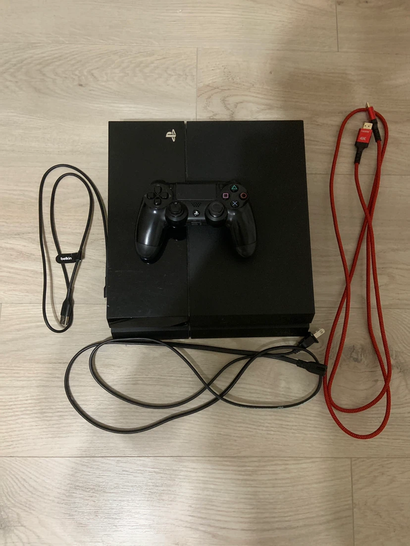 PlayStation 4 Console with Controller and Cables