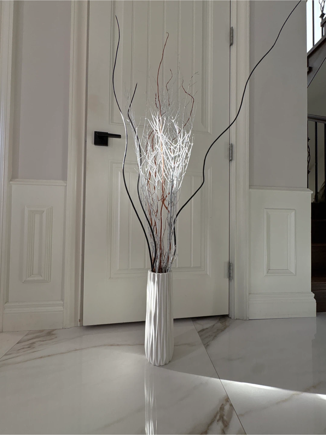 Decorative White Vase with Branch Arrangement