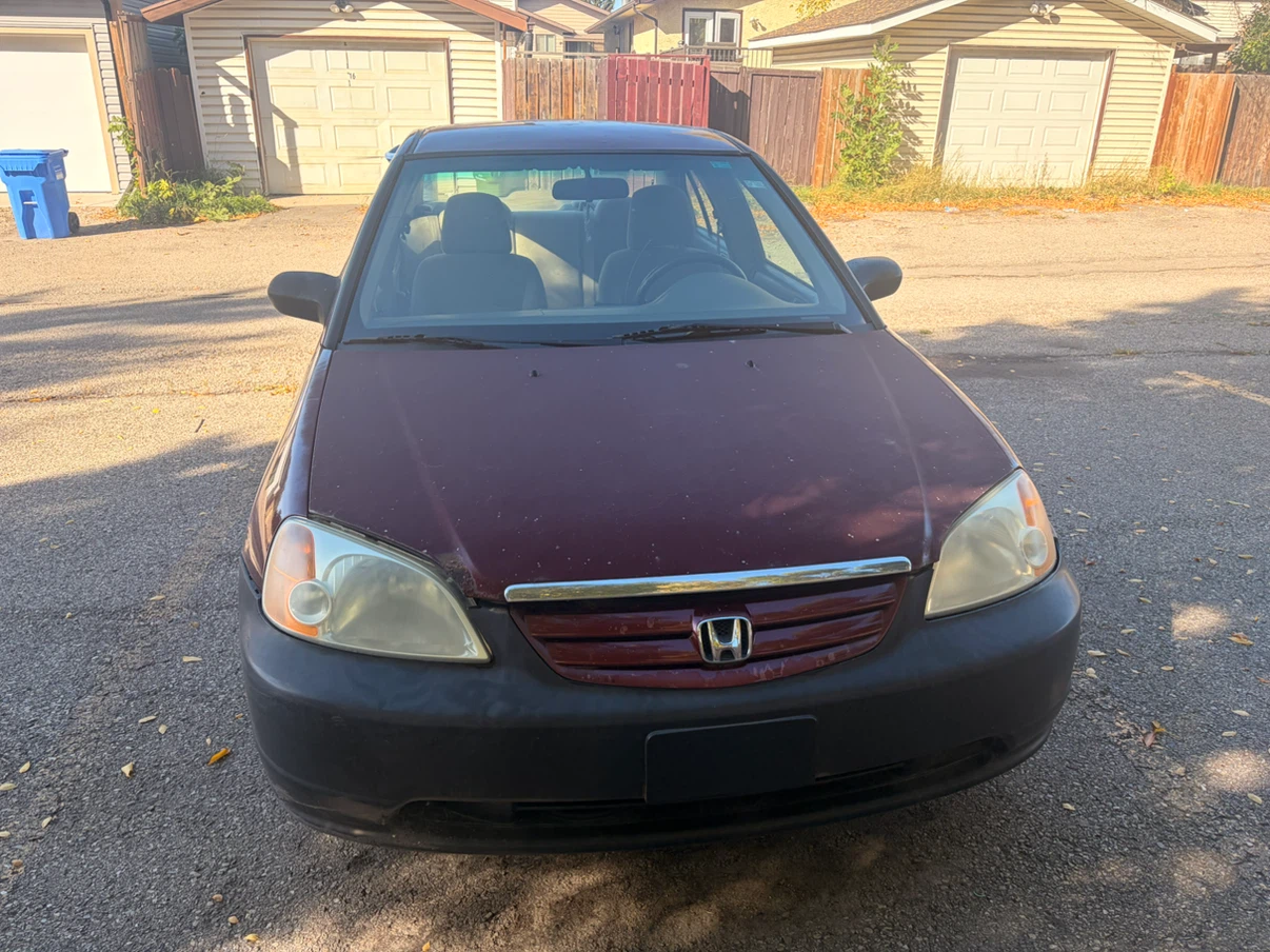 Maroon Honda Civic Sedan